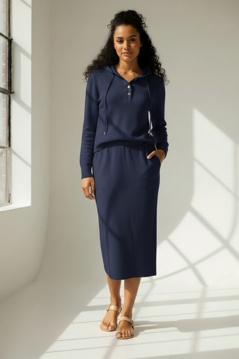 The KINROSS CASHMERE - DOUBLEKNIT SKIRT by KINROSS features a soft, velvet-like dark blue textured fabric reminiscent of double-knit material, with a consistent color and subtle fuzzy texture variations—ideal for crafting a chic midi-length skirt.