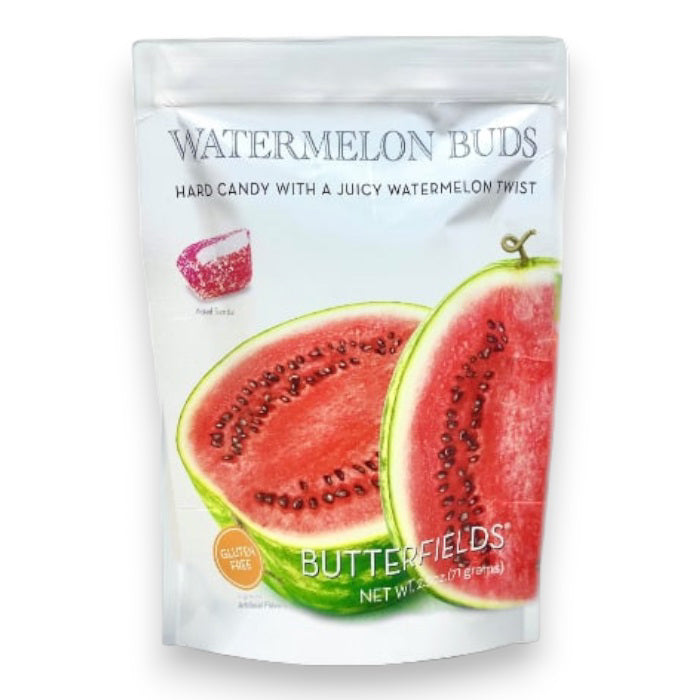 A white bag labeled "BUTTERFIELDS - WATERMELON BUDS" showcases images of watermelon slices. Inside, you'll find juicy watermelon Butterfields hard candy with a mouthwatering twist. The packaging highlights the product's gluten-free nature, net weight of 7oz (198 grams), and naturally flavored treats.