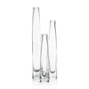 Three TATE Slim Clear Glass Vases by ZODAX are arranged on a white background. Each sleek, cylindrical vase has a narrow opening, including one measuring 2.5 in x 20.5 in.
