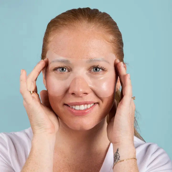 A rectangular package with a white background prominently displays the text &quot;LAPCOS - HYDRA COLLAGEN LIFTING EYE MASK&quot; alongside a light blue illustration of an eye mask. Infused with Marine Collagen and tripeptide complex, the brand name &quot;LAPCOS&quot; is shown at the bottom.