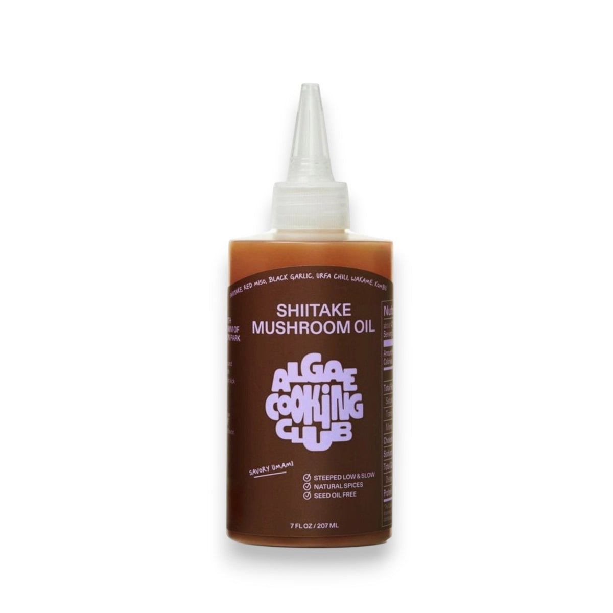 A bottle of ALGAE COOKING CLUB Shiitake Mushroom Oil with a pointed nozzle cap, brown and white label, described as a natural, savory Umami Finishing Oil that’s seed oil free.