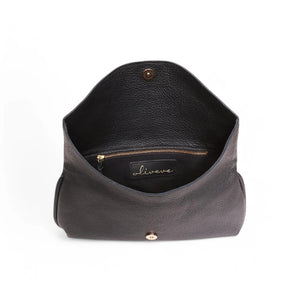 OLIVEVE Valentina Clutch in black Italian buffalo cowhide, a pebbled leather bag with a rounded fold-over flap.