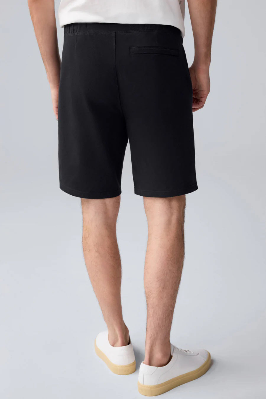 The MACK WELDON ACE Sweatshort 9" in navy features French terry fabric, side pockets, an elastic waistband, a tailored fit, and inner "Mack Weldon" branding—all laid flat on a white background for a polished look.