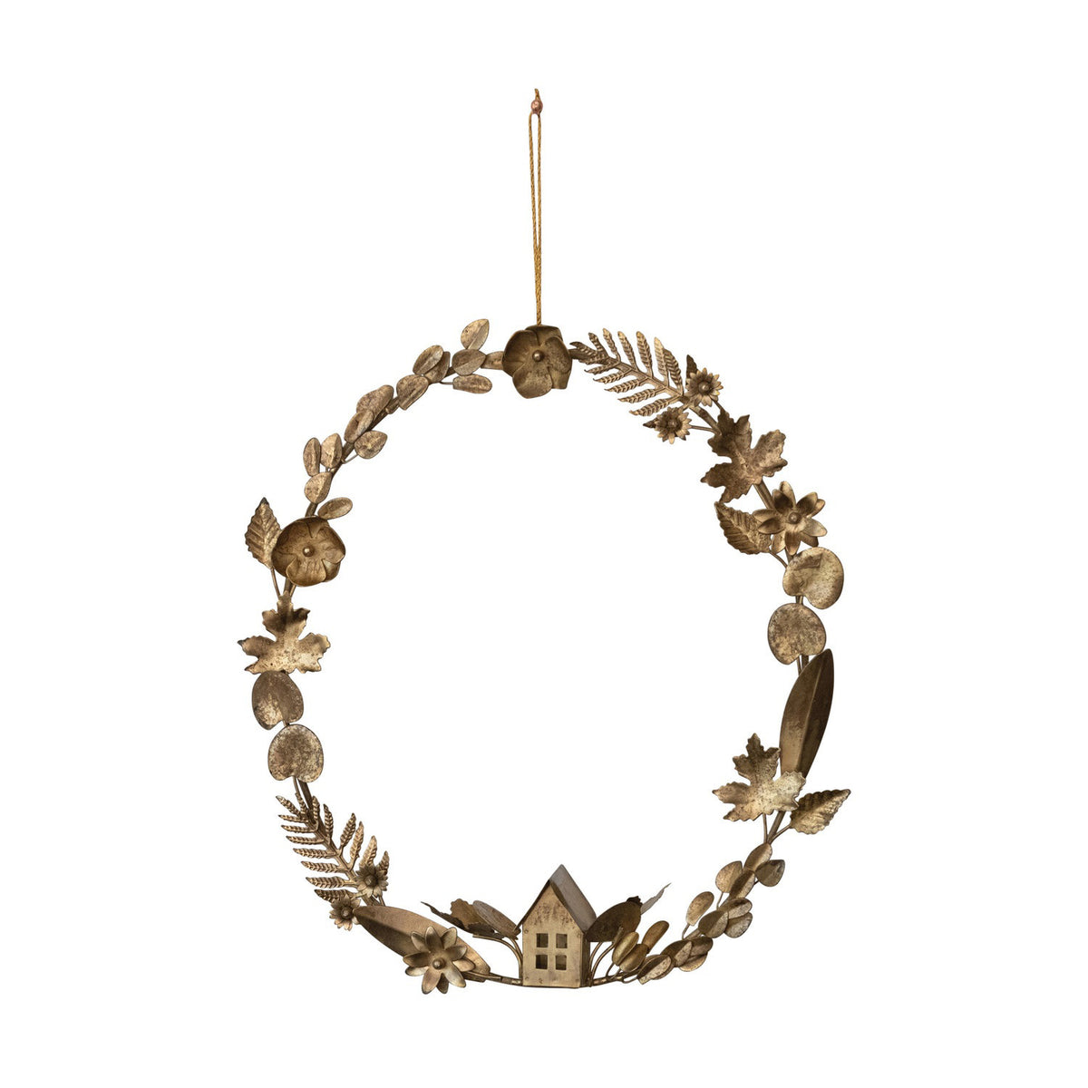 The CREATIVE COOP METAL WREATH WITH LEAVES AND FLOWERS features gold leaves, delicate flowers, and a small house, hanging by a thin gold string against a white background.