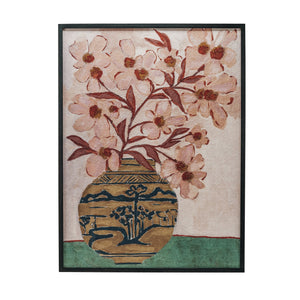 Introducing the WOOD FRAMED FLORAL WALL ART - PINK FLOWERS IN CHINOISERIE VASE from CREATIVE COOP. This oversized wall decor showcases a painting of pink flowers with red stems arranged in a decorative chinoiserie vase adorned with an intricate landscape pattern of trees, hills, and water. Set against a background that transitions from light pink above to green below, this elegant piece is beautifully framed in black wood, making it a striking addition to any space.