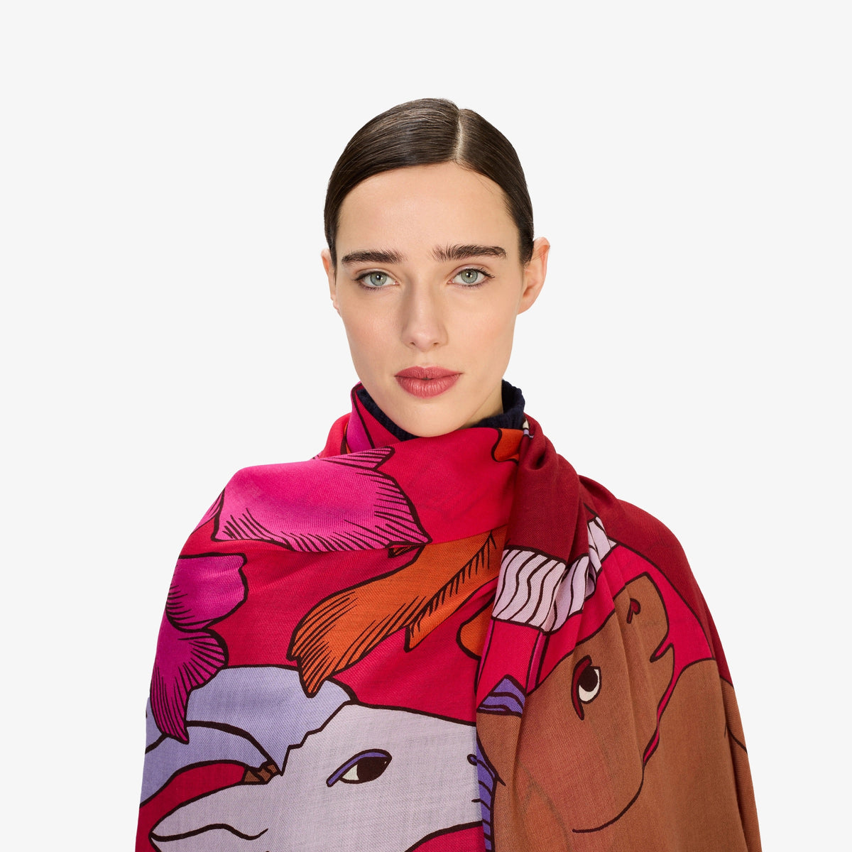 Close-up of the INOUI EDITIONS - CAVALE WOOL SCARF IN RED by INOUI, featuring crumpled wool in red, pink, and orange with dark brown abstract lines. Its woven texture and bold style make it a perfect winter accessory.