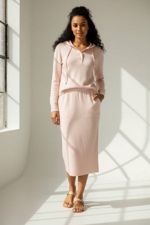 The KINROSS CASHMERE - DOUBLEKNIT SKIRT by KINROSS features a soft, velvet-like dark blue textured fabric reminiscent of double-knit material, with a consistent color and subtle fuzzy texture variations—ideal for crafting a chic midi-length skirt.