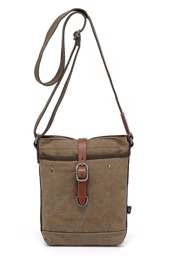 The TSD BRAND Forest Zip Crossbody Bag in olive features a khaki canvas design with a brown adjustable strap, front pocket, and brown leather strap with metal buckle and clasp—offering military-inspired style and practical utility.