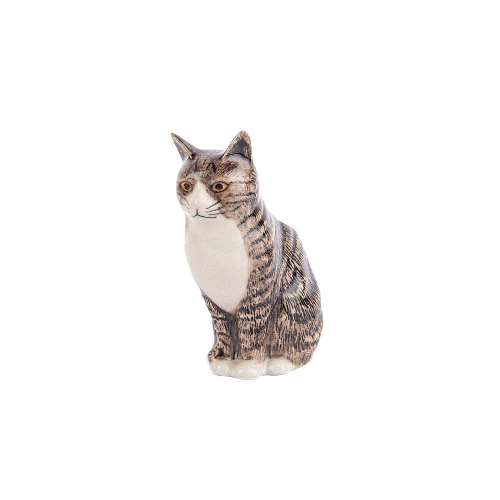 The QUAIL CERAMICS - MILLIE CAT BUD VASE by QUAIL DESIGNS is a ceramic vase shaped like a gray tabby cat, with flowers displayed as if sprouting from its head—an adorable gift for cat lovers.