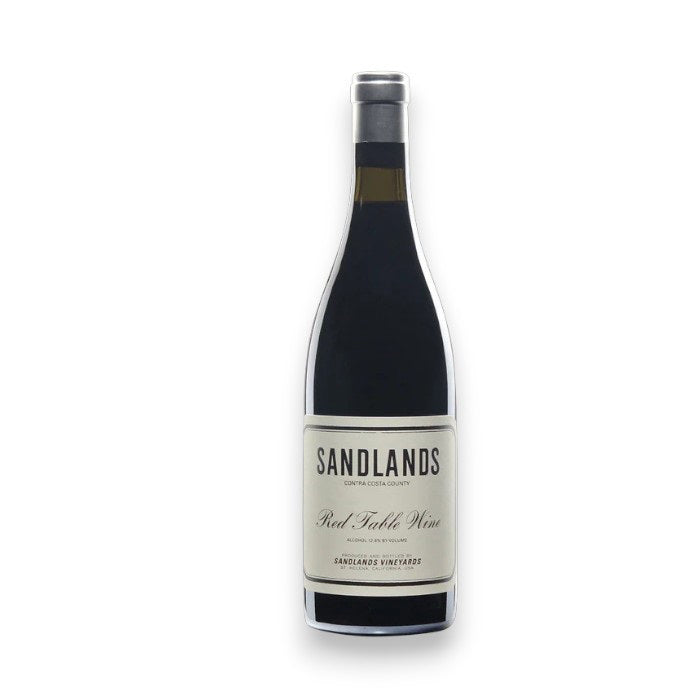 A bottle of Sandlands 'Red Table Wine' Lodi, under the Kellogg Selections brand, comes from Lodi, a notable California wine region. The bottle features a cream label with black text and a dark cap against a plain white background.
