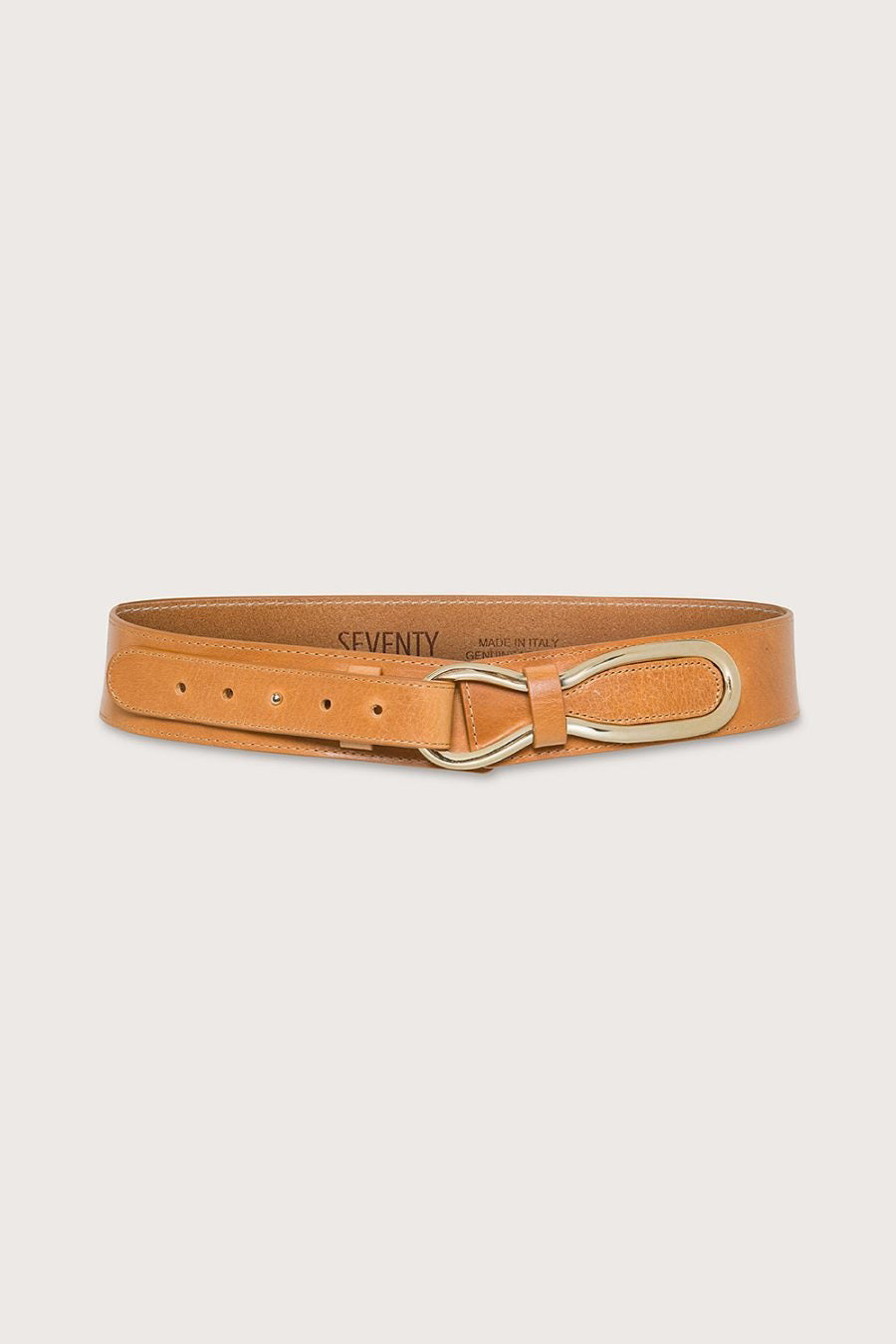 The SEVENTY VENEZIA - WASHED LEATHER BELT by SEVENTY showcases a sleek tan design with a handcrafted gold-tone loop buckle, elegantly displayed flat against a light background.