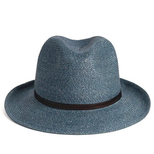 The charming LEATHER TIE PAPER HAT by TRAVAUX EN COURS is a pink, lightweight, woven pattern fedora featuring a wide brim and black band on the crown, set against a plain white background.