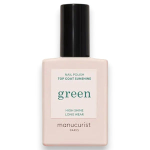 A bottle of MANUCURIST INC’s GREEN™ NAIL POLISH SUNSHINE TOP COAT, featuring “High Shine Long Wear” on the label, is shown on a white background; this plant-based top coat delivers a long-lasting manicure.