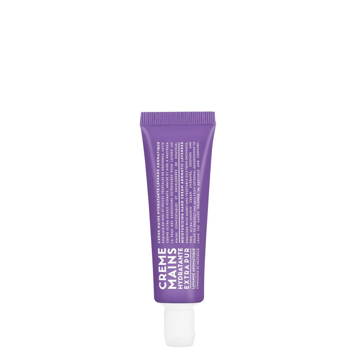 A purple tube of CIE LUXE BRANDS&#39; COMPAGNIE DE PROVENCE TRAVEL HAND CREAM AROMATIC LAVENDER 1OZ stands upright, featuring &quot;Creme Mains&quot; and details about botanical oils in white text on a white background.