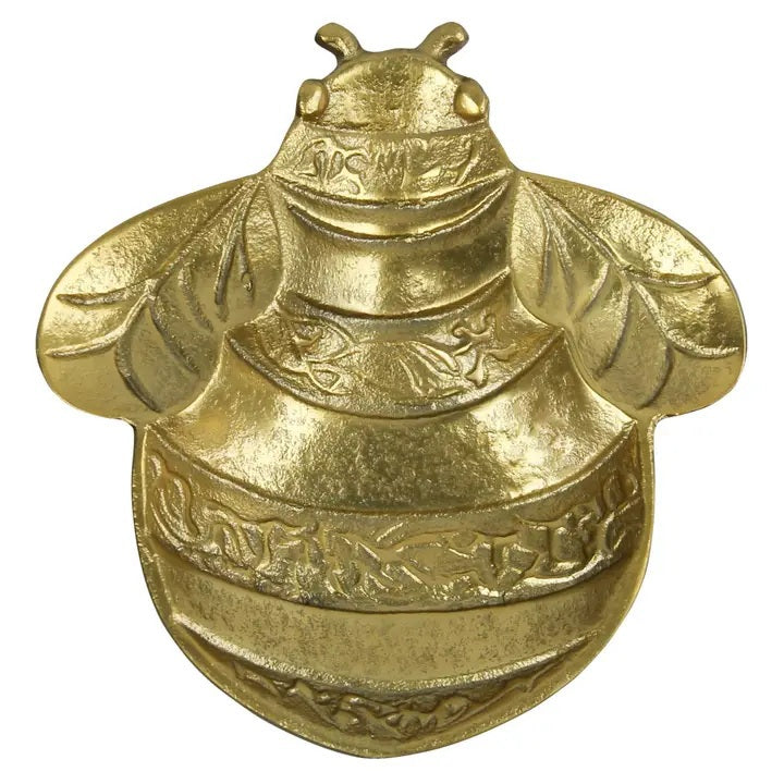 The HOMART GOLD BEE TRAY features a shiny, gold-toned metal bee with engraved details—ideal for display or as a unique jewelry holder.