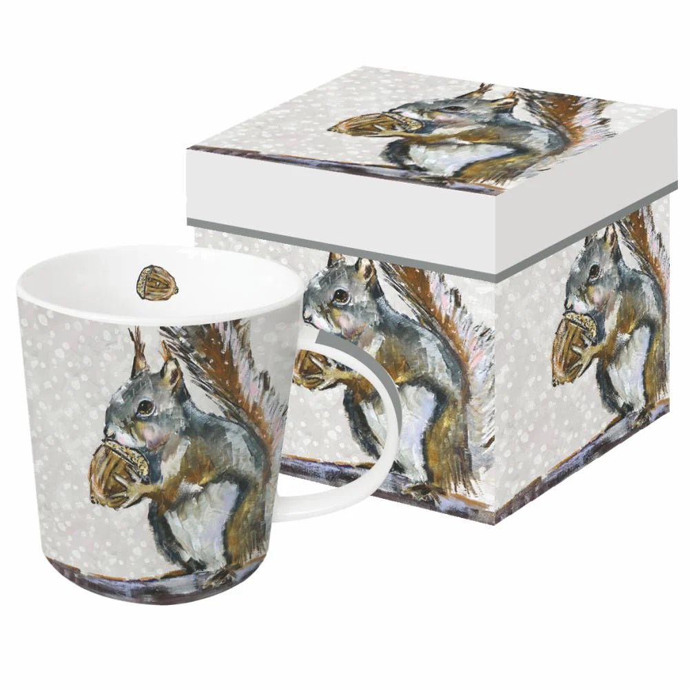 The PAPER PRODUCTS DESIGN SQUIRREL PORTRAIT GIFT-BOXED MUG features a gray squirrel with a walnut on a snowy background and comes in a matching decorative box—an ideal gift for animal lovers.