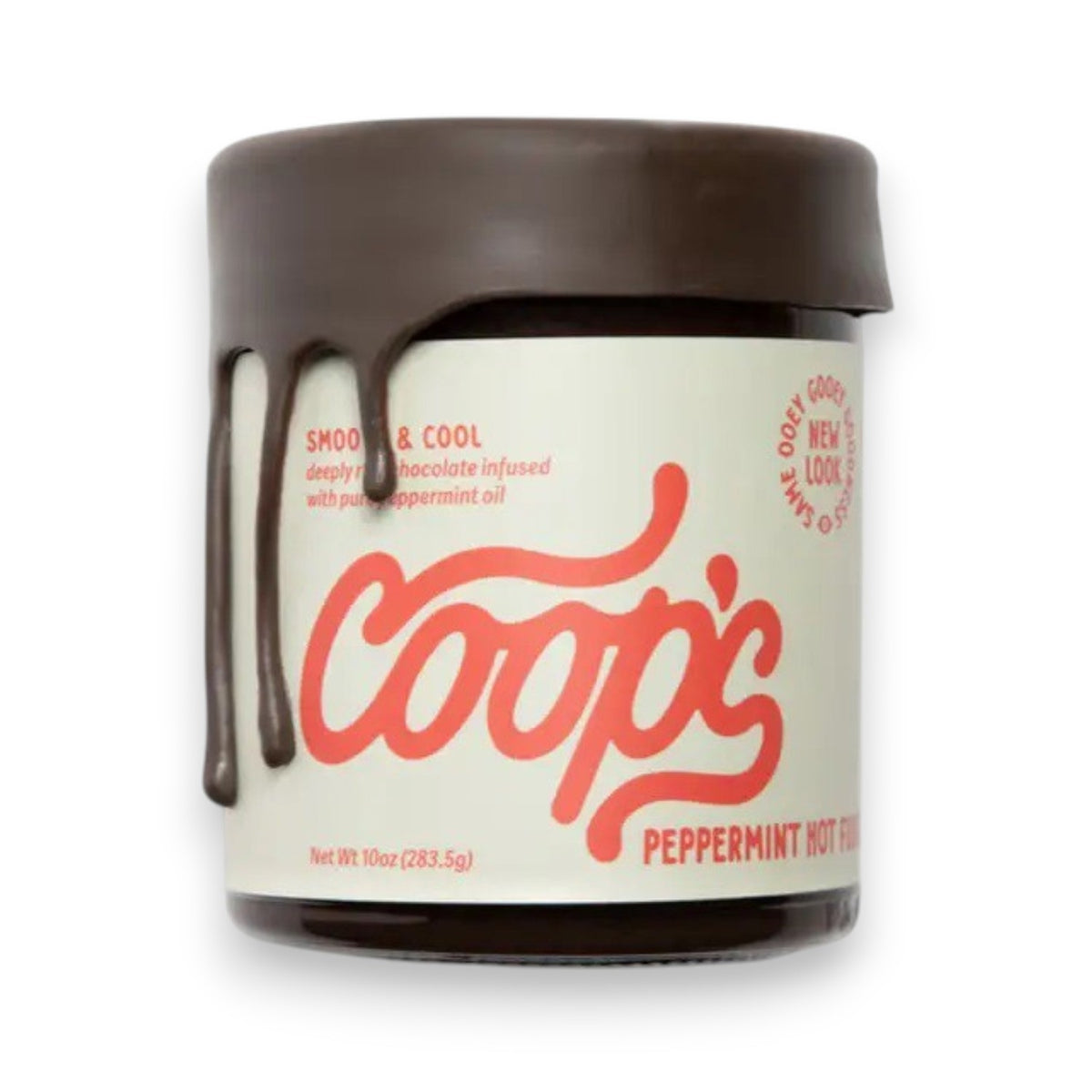 A jar of COOPS PEPPERMINT HOT FUDGE features rich European chocolate and refreshing peppermint oil. Its cream-colored label with red lettering highlights this decadent chocolate sauce from the brand COOPS.