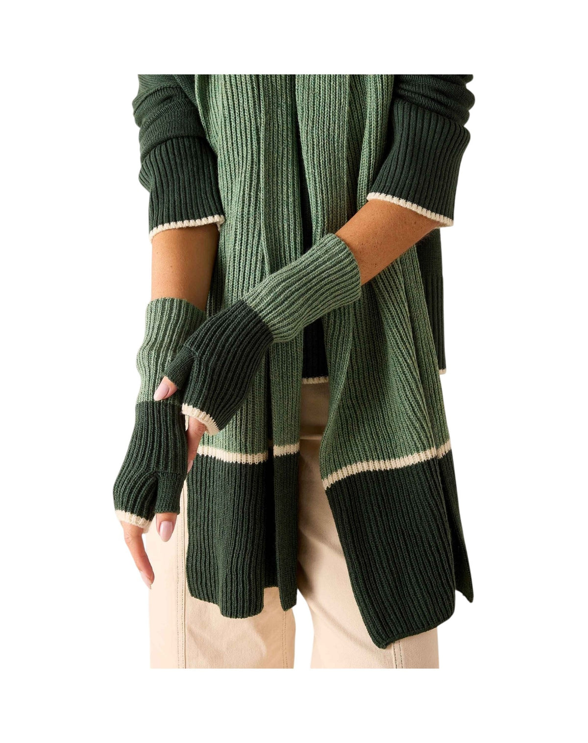 A long, ribbed knit scarf in two shades of green with a beige stripe separating them is laid out on a white background—perfect for pairing with your favorite travel-ready gloves or MERSEA’s Montauk Colorblock Fingerless Gloves in Eden for effortless seasonal style.