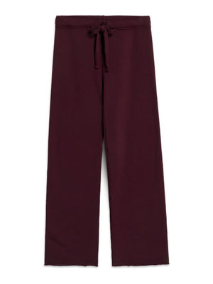 The FRANK & EILEEN Catherine Long Sweatpant in Currant is a pair of 100% cotton, wide-leg sweatpants with a drawstring waistband, shown laid flat on a white background.