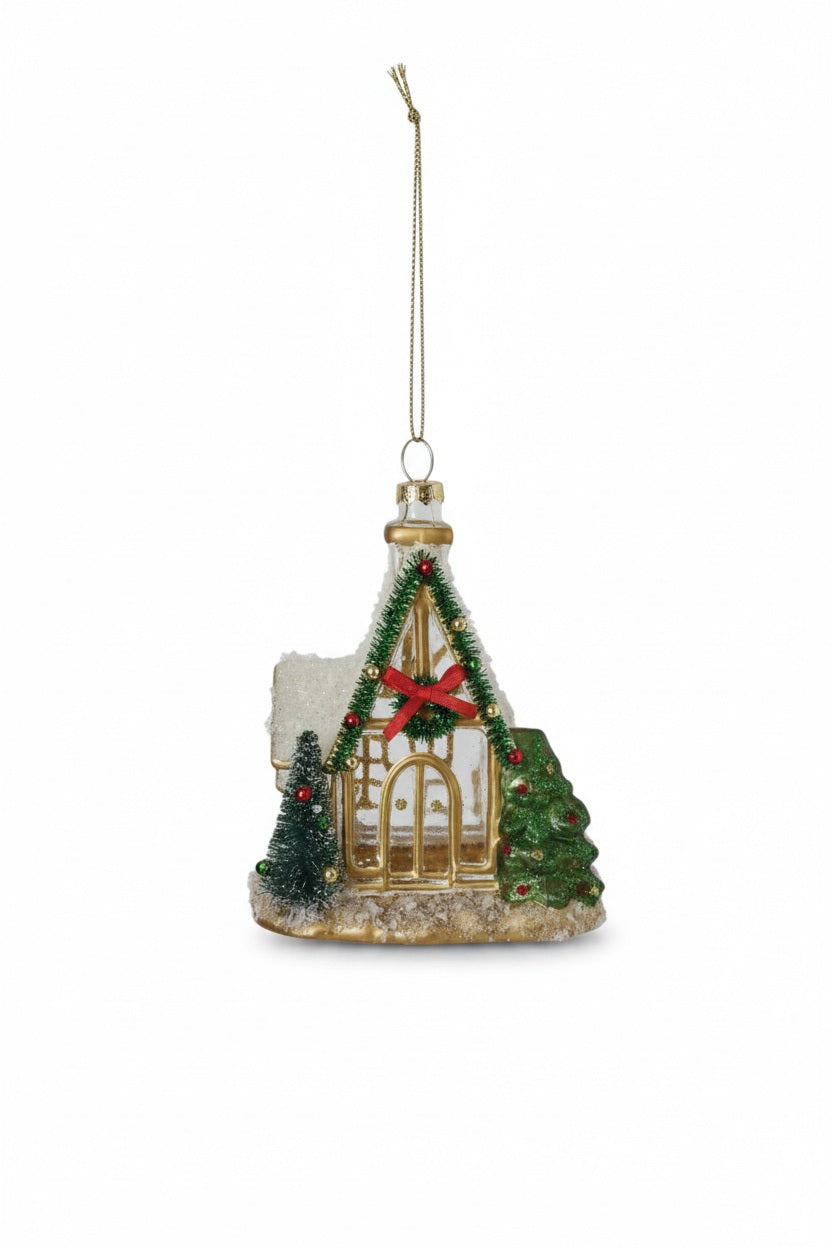 CHAPEL ORNAMENT WITH BOTTLE BRUSH TREE decorated with a red bow, a green garland, and two vintage bottle brush trees.
