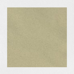 A person is wearing the MEIMEIJ - TOP WITH KNOT BACK DETAIL in orange, featuring wide sleeves and a stylish knot back design, paired with matching relaxed-fit orange pants. The outfit appears loose and comfortable, perfect for a casual look. The background is a plain, light-colored texture.