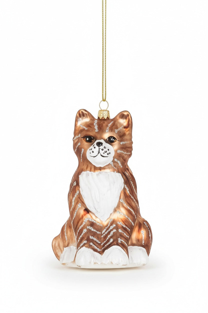 TABBY CAT ORNAMENT made of glass featuring brown tabby stripes, a white chest, and white paws.