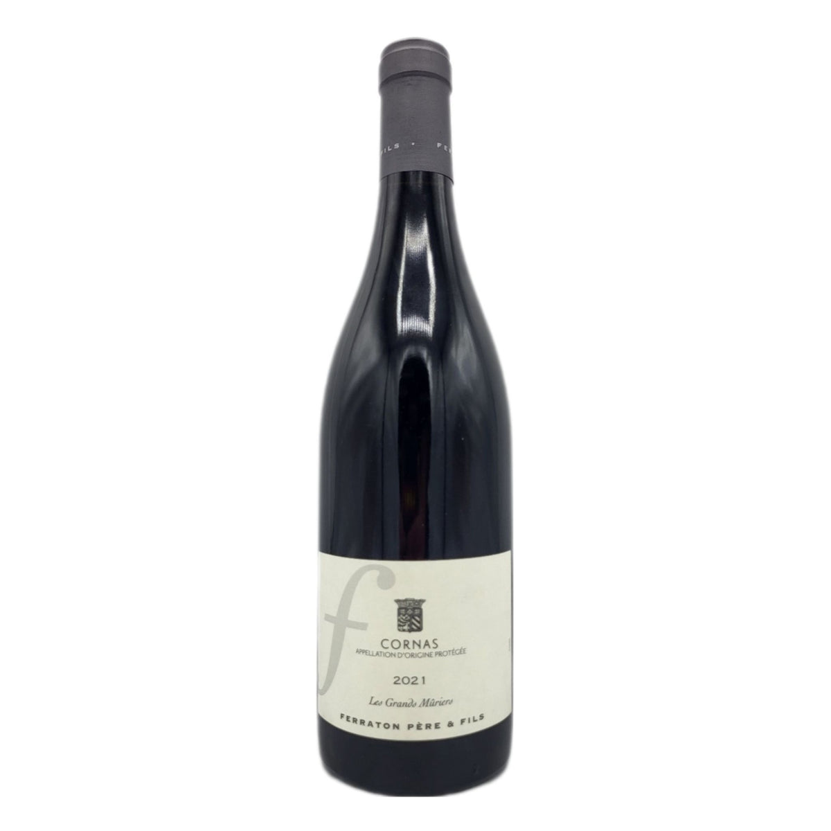 A bottle of FERRATON ‘LES GRANDS MURIERS’ CORNAS 2021 from WINE: 3 KEYS, an esteemed Northern Rhône Syrah, featuring a cream label and black capsule, stands upright against a white background.