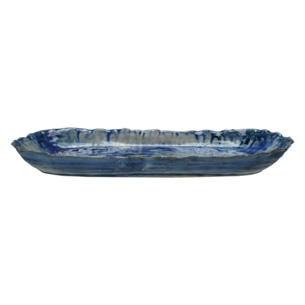 The CREATIVE COOP BLUE STONEWARE ORGANIC-SHAPED PLATTER features a wavy, textured edge and is shown from top and side angles. Its hand-crafted appeal is enhanced by a reactive crackle glaze in blue with white accents.