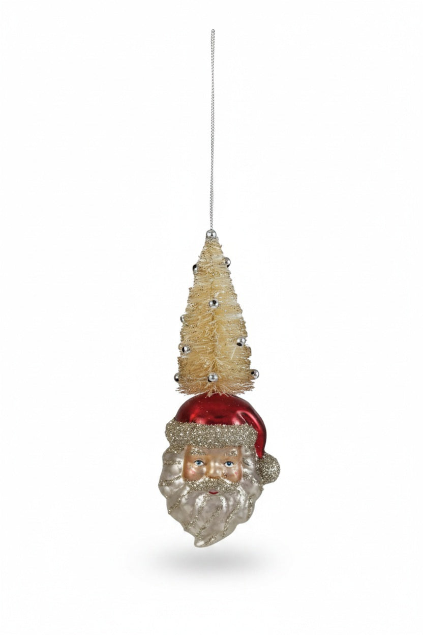 Creative Coop Santa Head with Bottle Brush Tree, a hand-painted vintage holiday ornament featuring a Santa Claus head in a red hat topped with a small, silver-beaded bottle brush tree.