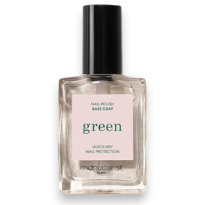A clear glass bottle of MANUCURIST - GREEN™ BASE COAT by MANUCURIST INC, featuring a black cap and a white label with green and black text, part of their vegan nail care collection.