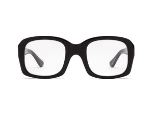 CADDIS - SHELBY PROGRESSIVE READERS by CADDIS are black, square, thick-rimmed eyeglasses with oversized frames and clear, scratch-resistant lenses. Shown front-facing on white; "Shelby" printed in white inside the left arm.