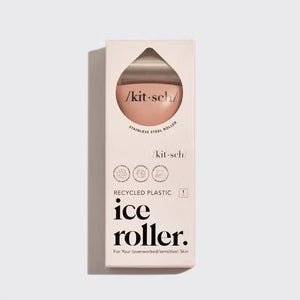 The beige packaging of the "KITSCH - ICE FACE ROLLER," featuring surgical stainless steel, suits sensitive skin. Made from recycled plastic, circular icons on it emphasize benefits like enhanced blood circulation.