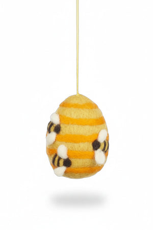 BUSY BEE HIVE ORNAMENT made of egg-shaped colourful wool felt with yellow and orange stripes, decorated with three small bees and featuring a jute twine loop for hanging.