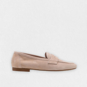 A side view showcases the MICHELE LOPRIORE - PAOLA SUEDE LOAFER in beige against a white background. This mocassin-style loafer, crafted from genuine leather, features a smooth texture with a simple design and low heel.
