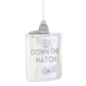 Cody Foster GLASS SILVER FLASK ORNAMENT shaped like a flask, featuring an anchor icon and the glittery silver text “DOWN THE HATCH” to celebrate holiday spirits.