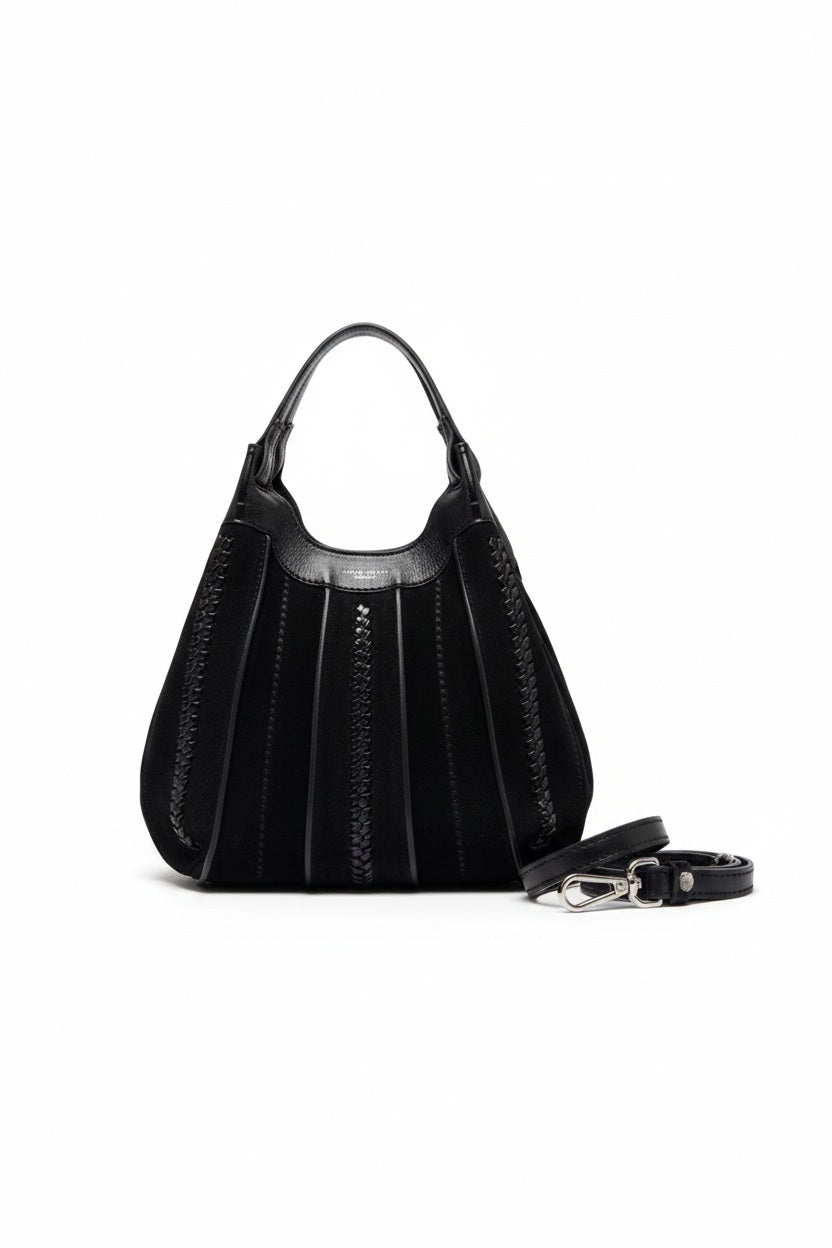 The GIANNI CHIARINI - DUA SUEDE HANDBAG IN BLACK showcases a sophisticated design with sleek suede panels, vertical stitched detailing, a rounded handle, and a detachable shoulder strap, all presented against a plain white background.