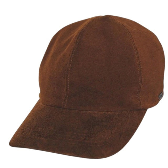 The WIGENS - CLASSIC SUEDE BASEBALL CAP IN BROWN is crafted from brown suede and features a curved brim, visible panel stitching, and a subtle metallic WIGENS label on the side. This timeless fitted cap by WIGENS is displayed against a plain white background.