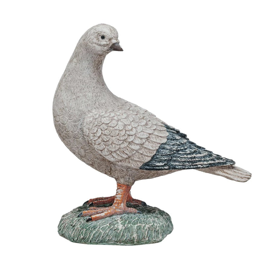 A detailed VINTAGE REPRODUCTION PIDGEON from CREATIVE COOP with textured gray feathers and dark gray wings stands on a green, grassy base. The lifelike pigeon figurine has an expressive face and intricate feather detailing, perfect for vintage-themed decor.