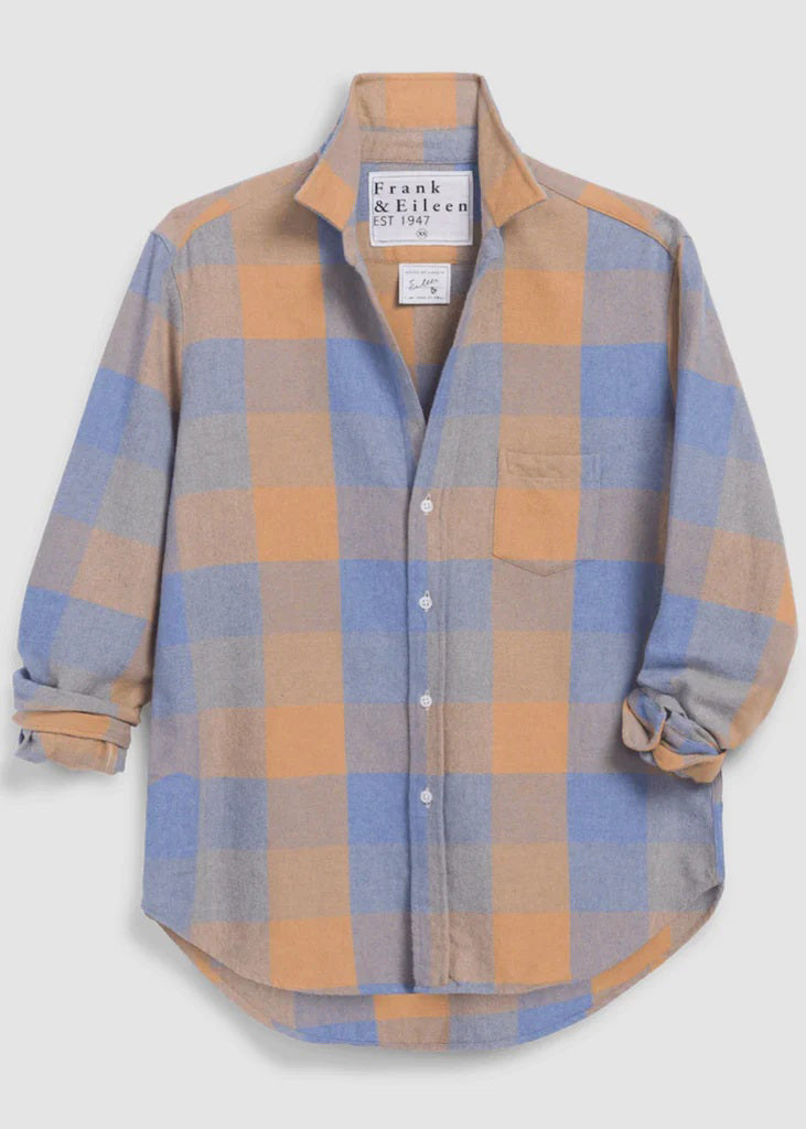 The FRANK &amp; EILEEN EILEEN Relaxed Button Up Shirt in Midweight Italian Flannel features a large blue and camel check pattern, long sleeves, bust-flattering buttons, rolled cuffs, a chest pocket, and a “Frank &amp; Eileen EST 1947” label.