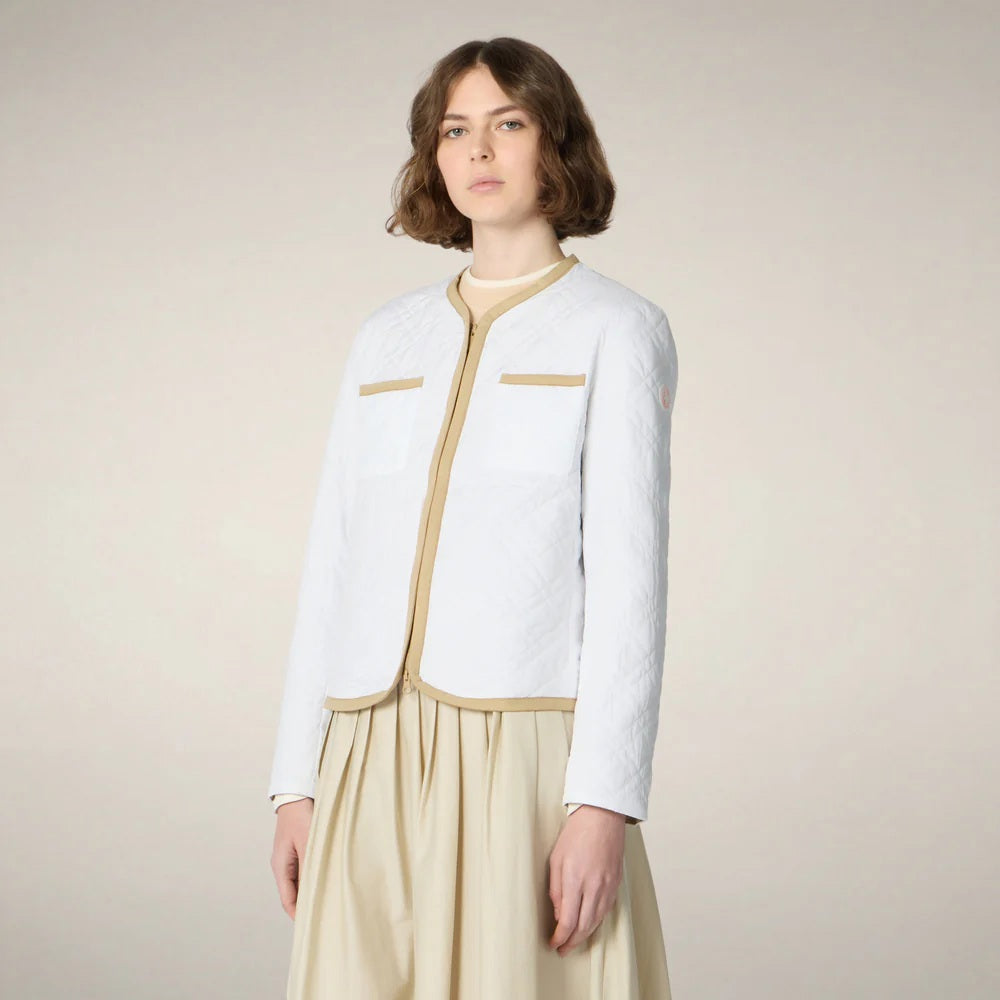 The SAVE THE DUCK JALINA PUFFER JACKET features diamond quilting, long sleeves, two chest pockets, and tan trim on the collar, zipper, cuffs, and hem. Displayed on a plain light background.