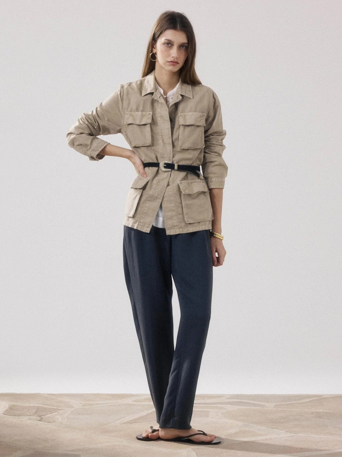 Fearrington Village Hartford VEA utility jacket in beige cotton and linen with four patch pockets on a female model