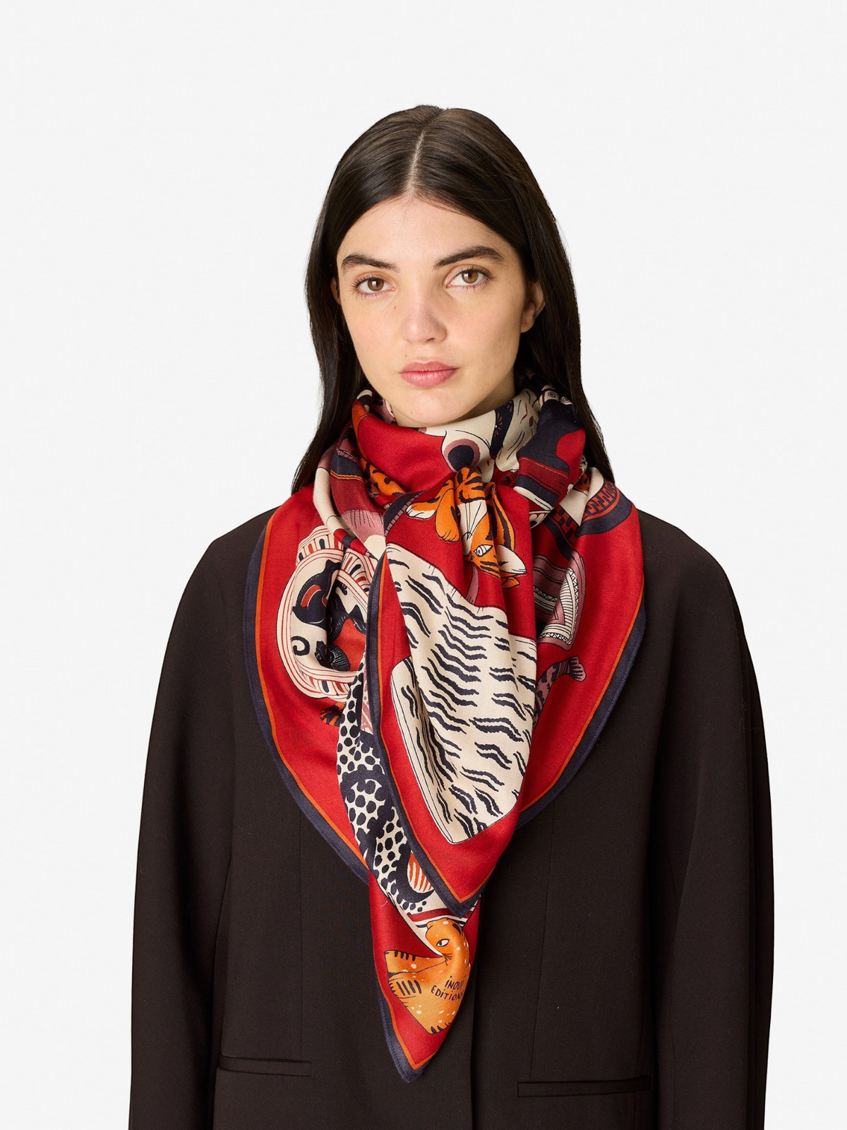 Fearrington Village Inoui Editions Collectionneur red silk modal scarf featuring cat illustrations on a model