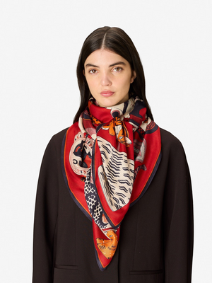 Fearrington Village Inoui Editions Collectionneur red silk modal scarf featuring cat illustrations on a model