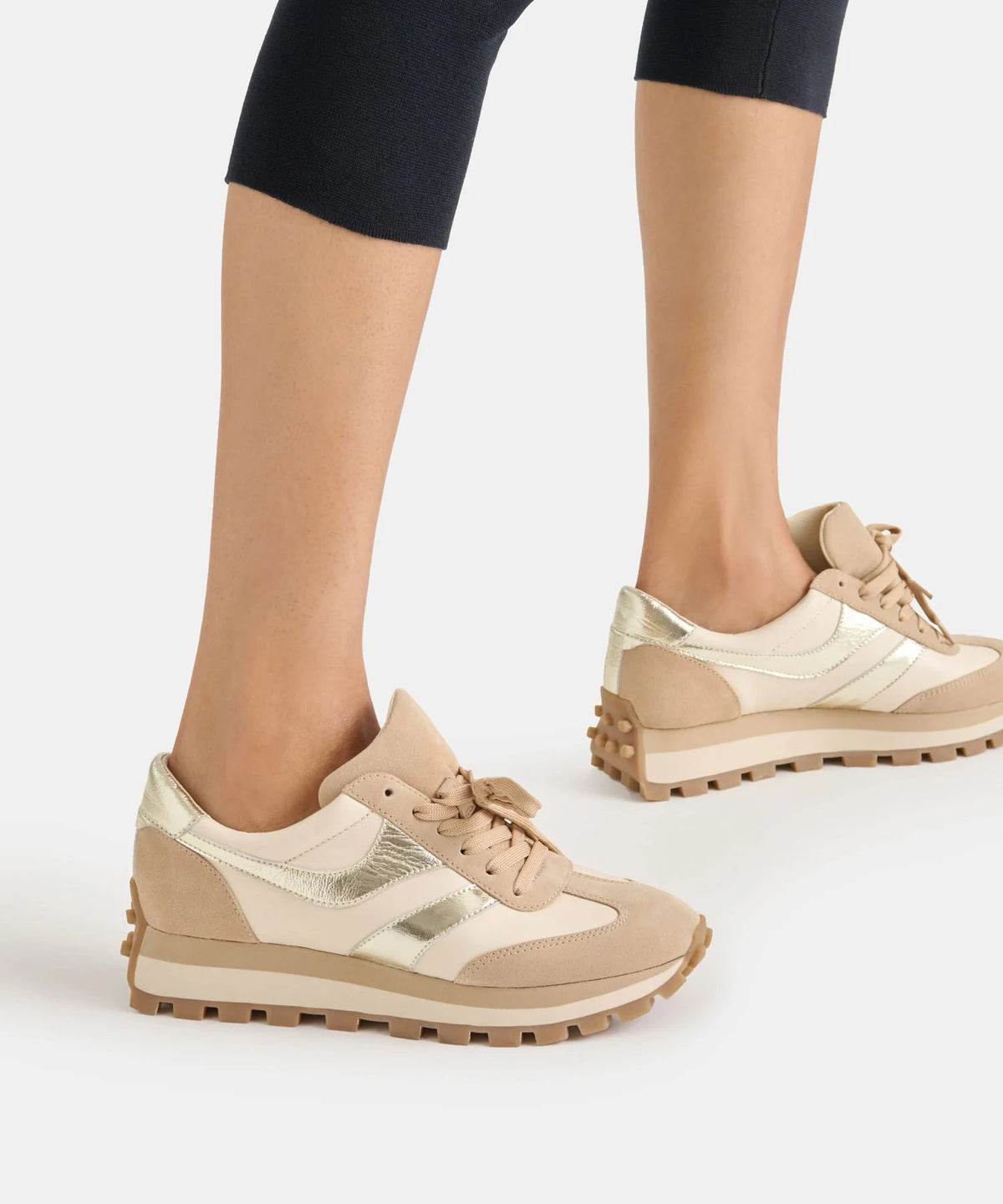 DOLCE VITA - TRESA SNEAKERS IN WHITE & GOLD SUEDE, a low-top sneaker in beige and layered suede with metallic gold accents and a sporty lug sole.