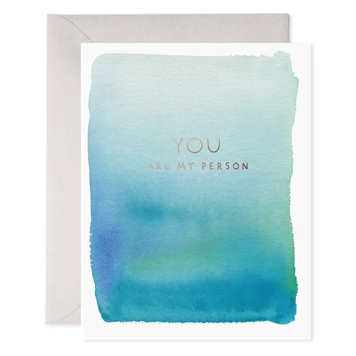 The E. FRANCES - YOU ARE MY PERSON card by E. FRANCES PAPER features a handcrafted watercolor blue-green rectangle on the front and comes with a light gray envelope. Subtle “E. Frances” branding is included, and it’s proudly made in the USA.