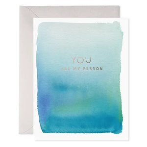 The E. FRANCES - YOU ARE MY PERSON card by E. FRANCES PAPER features a handcrafted watercolor blue-green rectangle on the front and comes with a light gray envelope. Subtle “E. Frances” branding is included, and it’s proudly made in the USA.