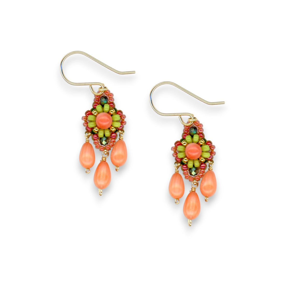 MIGUEL ASES - MIYUKI CRYSTAL BEAD EARRINGS from MIGUEL ASES, INC. feature a green, orange, and red beaded pattern with three teardrop-shaped orange beads dangling from the centerpiece and are finished with gold hooks for wearing.