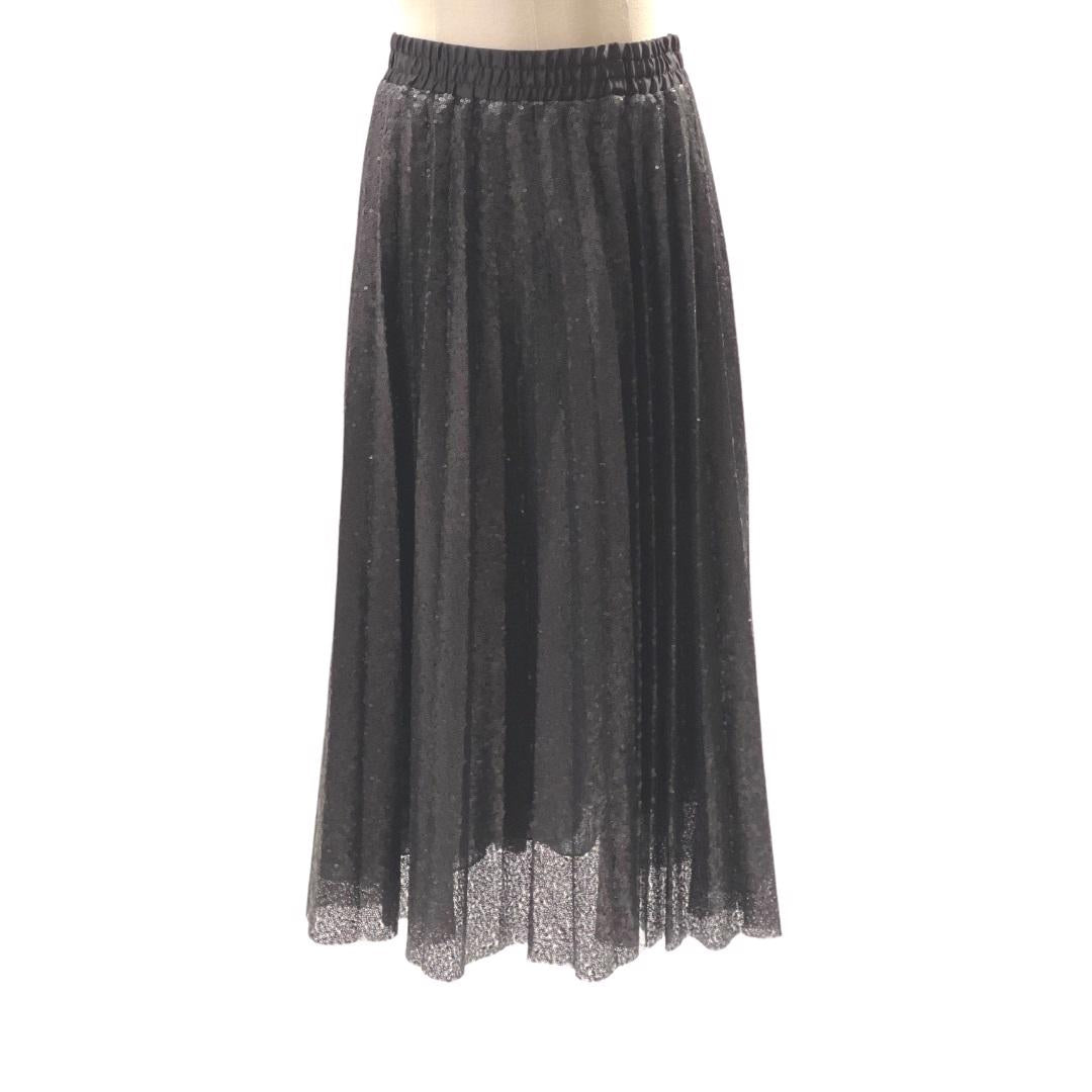 The BLACK SKIRT SEQUIN by SEVENTY is a knee-length, black pleated skirt made with shimmery textured fabric, perfect for an evening out. This fun skirt features an elastic waistband and is displayed on a white mannequin against a plain background.