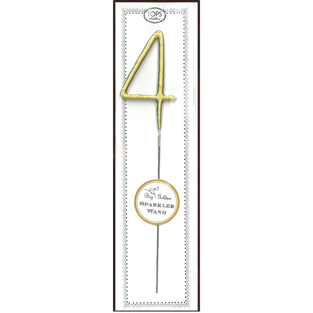 An unlit WAND BIG GOLD SPARKLER 4, shaped like the number four, is showcased inside packaging labeled "TOPS Malibu." The design is simple, featuring a white background with dotted borders and a circular label that reads "Big Golden Sparkler Wand," making it ideal as a cake topper with golden sprinkles.