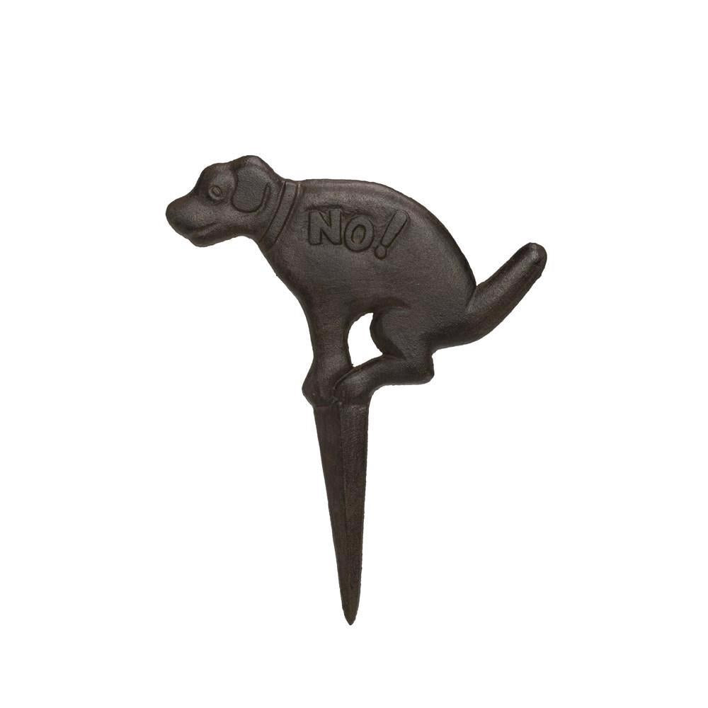 The CREATIVE COOP CAST IRON DOG STAKE &quot;NO,&quot; shaped like a squatting dog with &quot;NO!&quot; engraved on its side, serves as an effective pet deterrent and outdoor garden decor. The piece features a pointed stake at the bottom for easy insertion into the ground.
